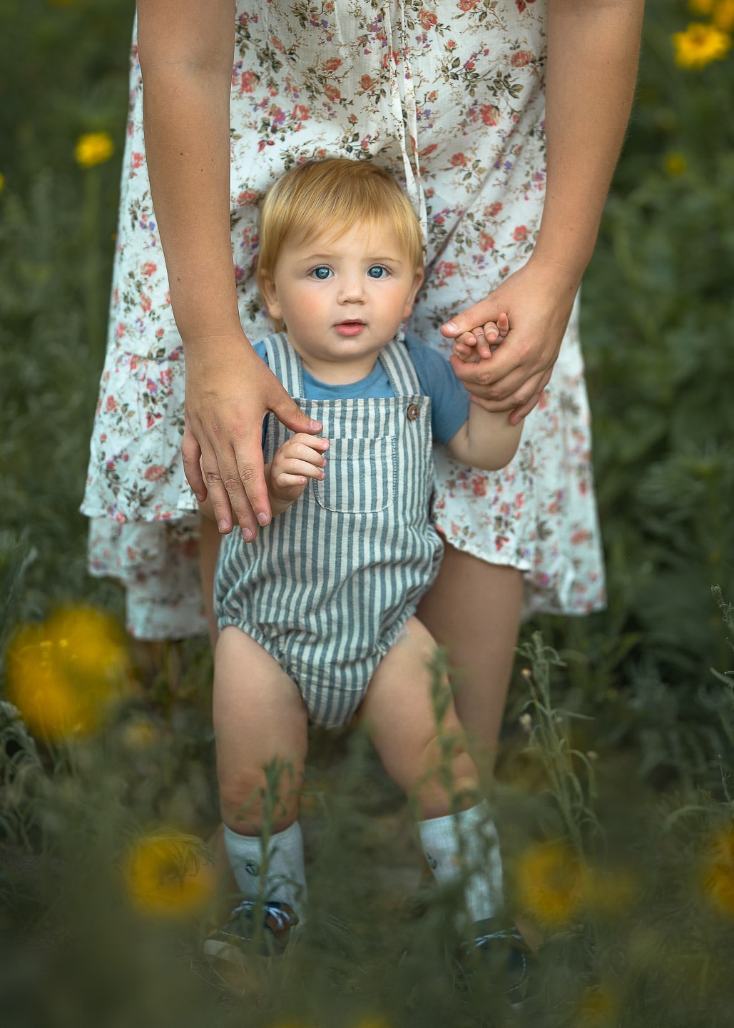 Perth Mum holding her toddlers hand during photoshoot