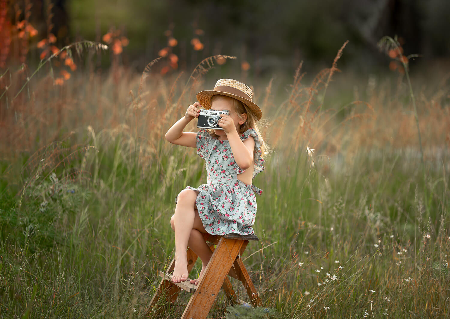 perth girl holding a camera during photo shoot