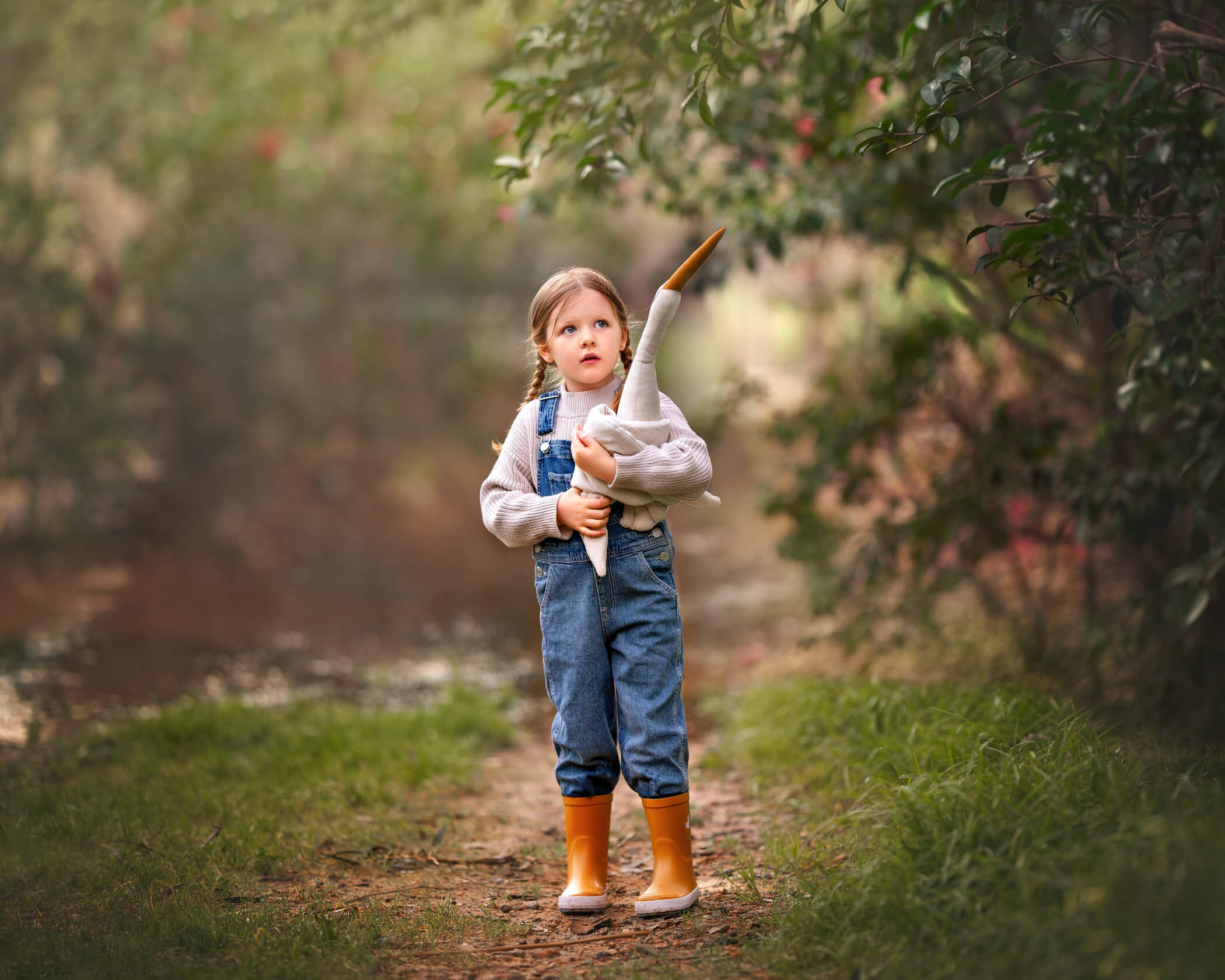 Perth child with her favourite toy during outdoor portrait shoot